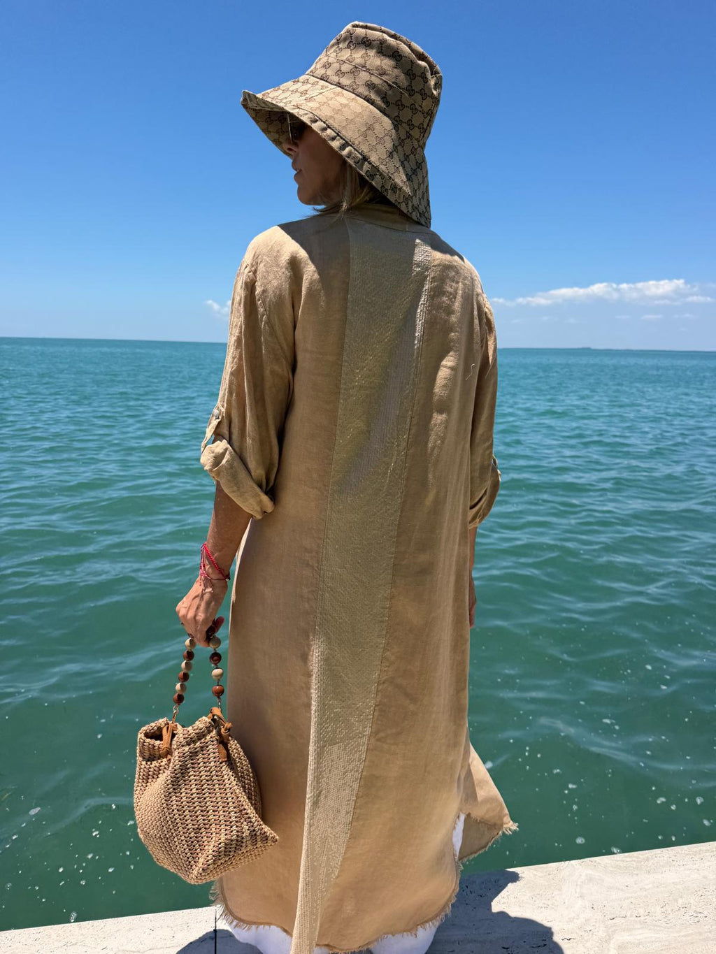 WOVEN BAG WITH BALL HANDLE